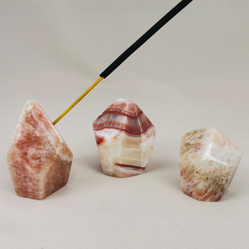 incense pink Aragonite crystal stand