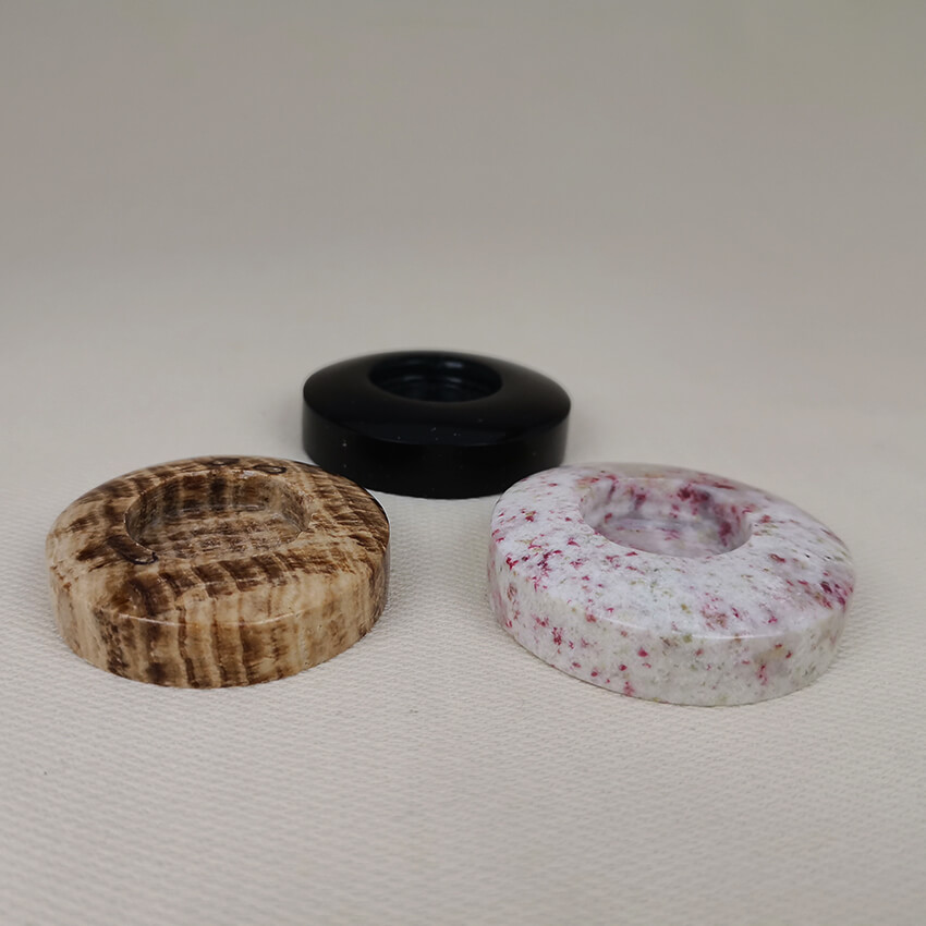 round stone sphere stands 3