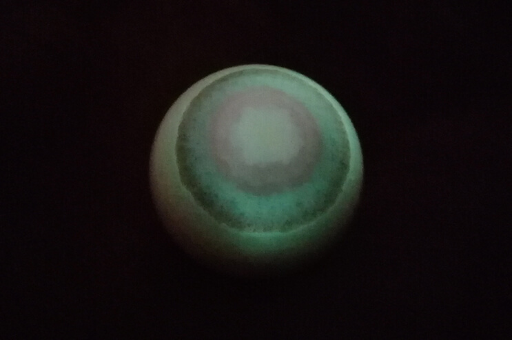phosphorescent peruvian ping aragonite glowing in the dark