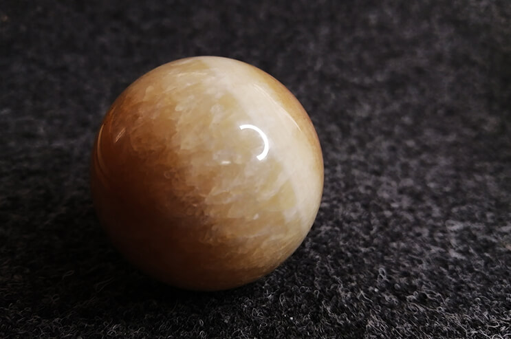 Peruvian pink aragonite sphere