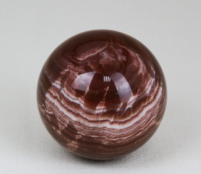 perfectly polished Red Aragonite sphere