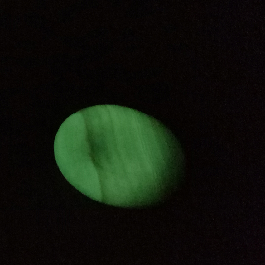 coati aragonite worry stone glowing in the dark