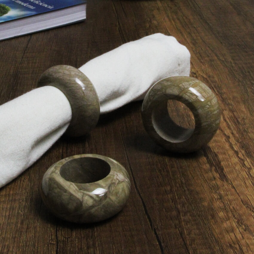 Exclusive napkin rings hand-made from caramel stone
