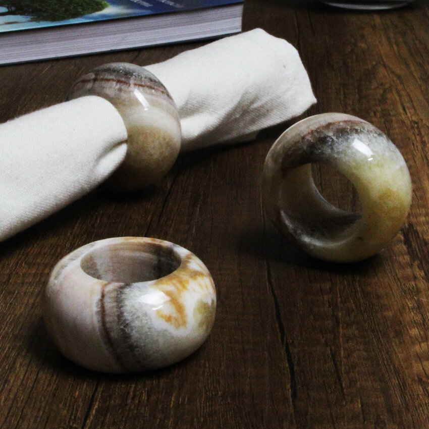 Exclusive napkin rings hand-made from coati aragonite