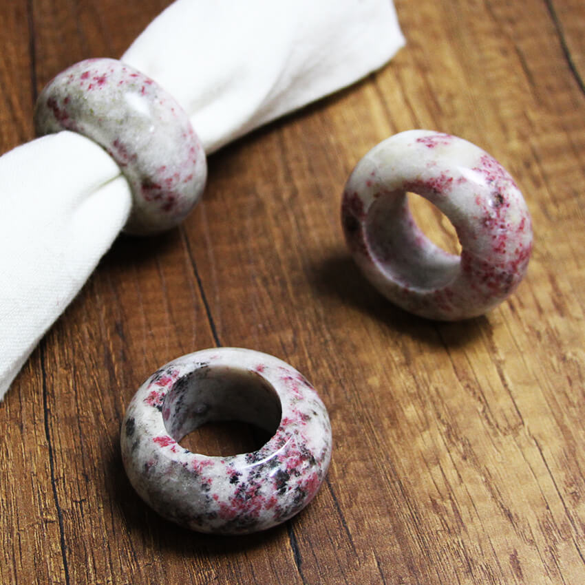 Exclusive napkin rings hand-made from cherry blossom stone