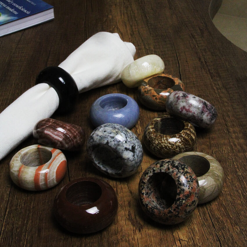 A collection of Gemrock Napkin rings from different stones
