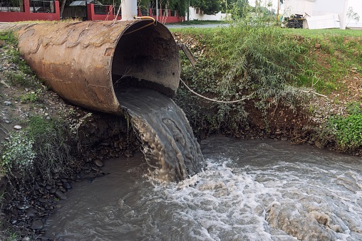 Dirty sewage from the pipe, environmental pollution