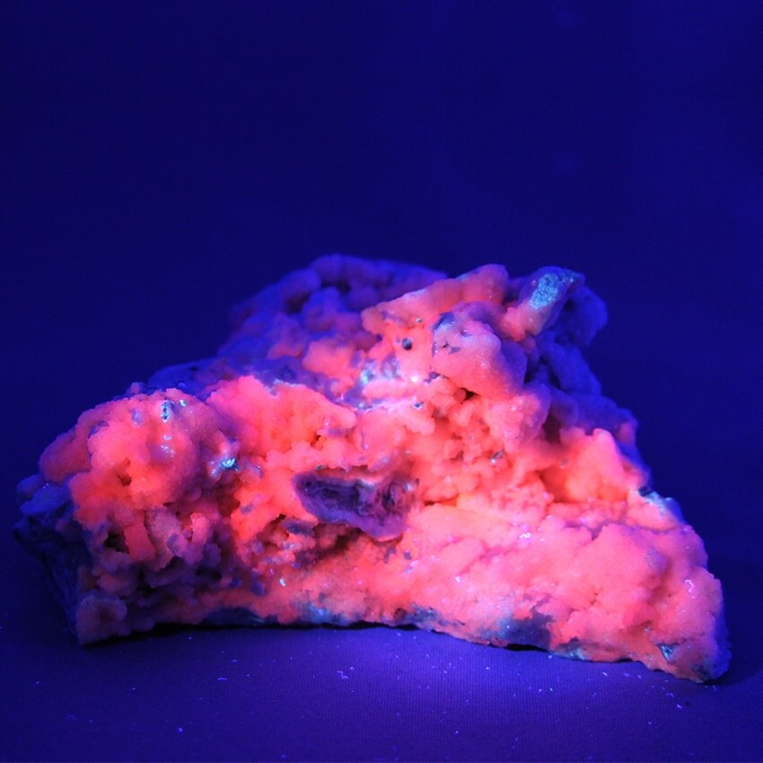 Fluorescent Manganocalcite crystals offered by Gemrock Peru in Flats