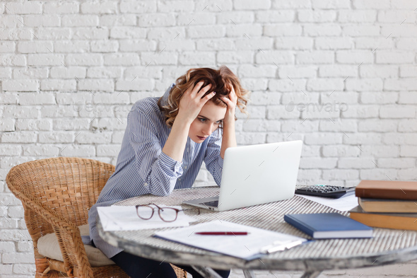 Portrait of tired young business woman with laptop computer. Quartz Crystals and combinations of quartz with other minerals offered by Gemrock Peru in flats