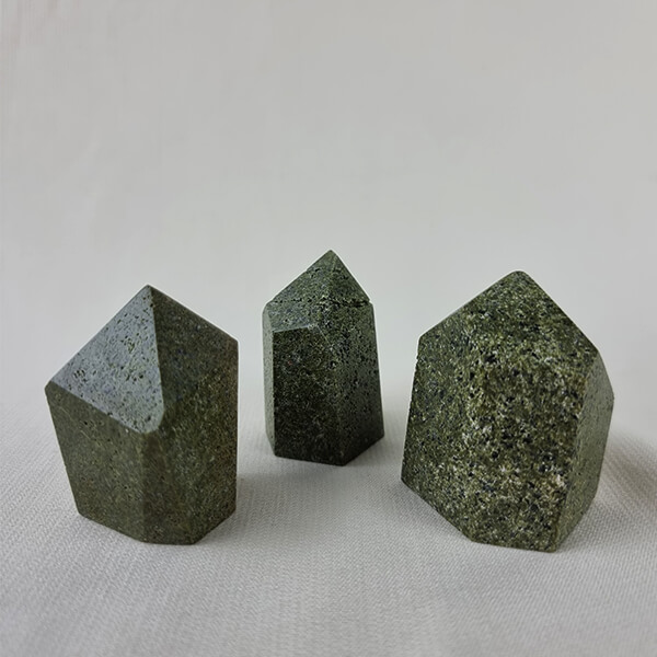 Epidote free Forms ti rhodonite with green epidote egg