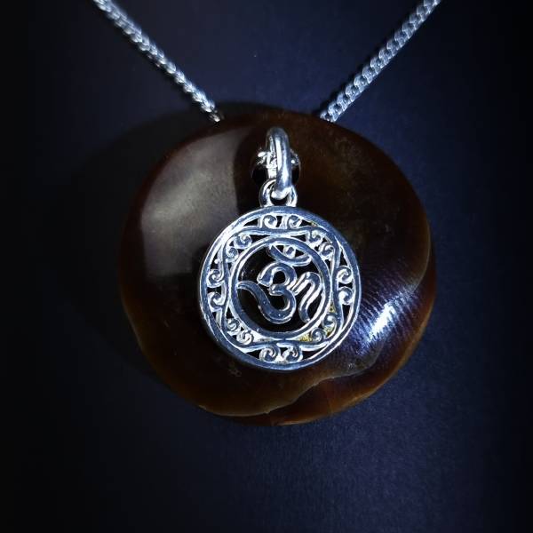 peruvian chocolate calcite personalized jewelry silver pendant on carved chocolate calcite crystal backplate