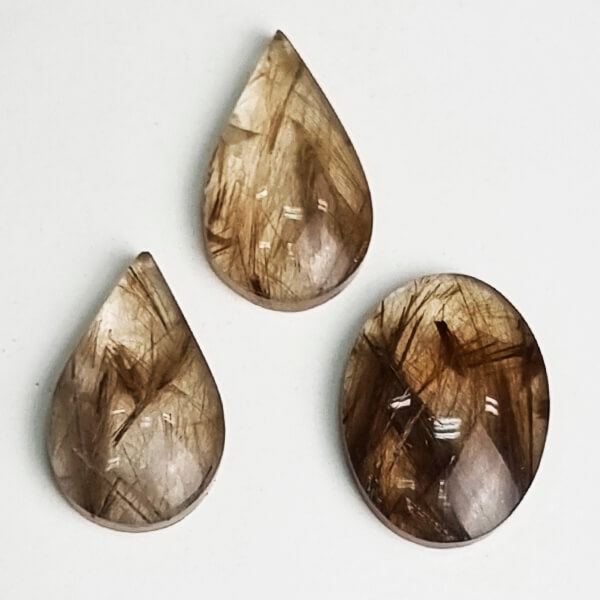 Rutilated Quartz ti top-quality, premium-cut Peruvian rutilated Quartz Cabochon gemrock ethical crystals and jewelry