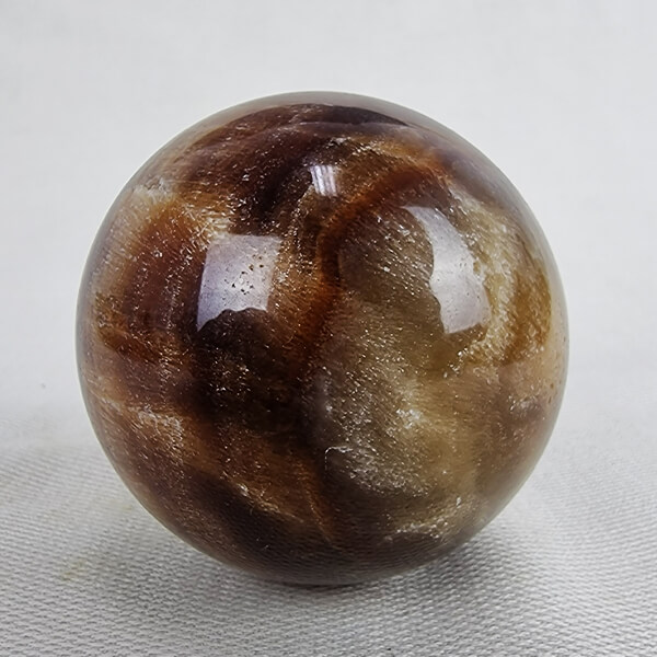 Chocolate Calcite sphere ethically sourced crystals Gemrock