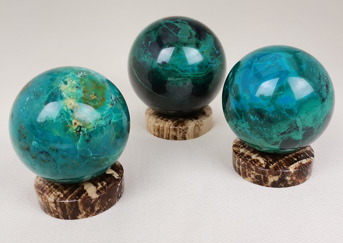 Ethically sourced Aragonite Crystal Sphere stands Gemrock