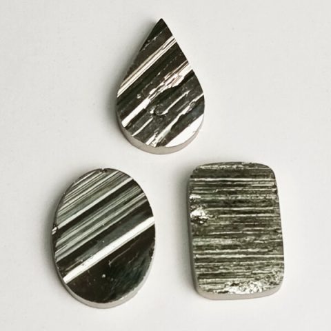 Pyrite cabochon crystal-surface ethical crystal jewelry Gemrock 02 pyrite gemstone quality standard