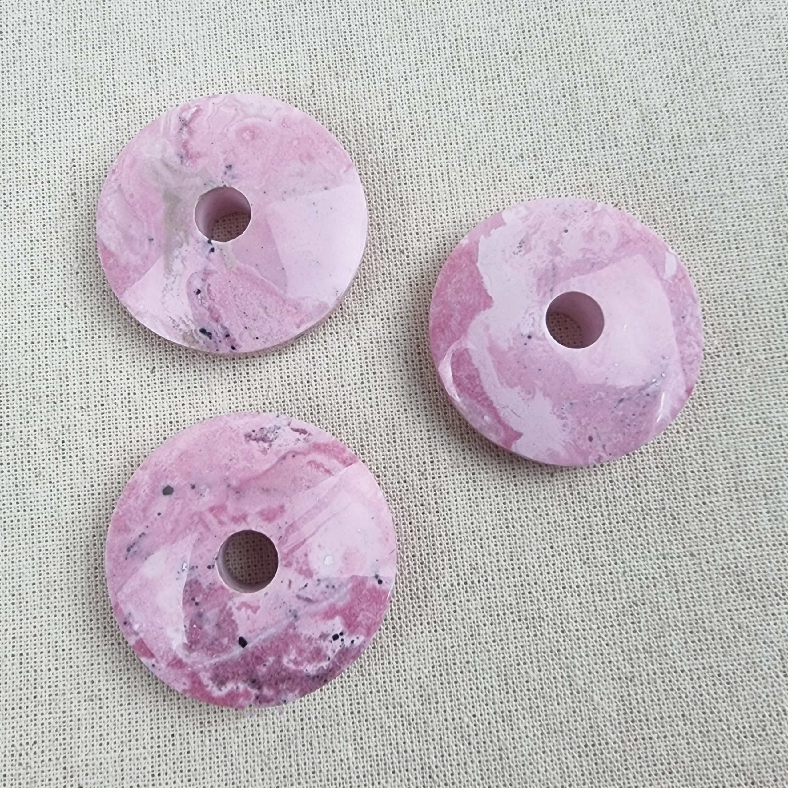 Rhodonite top-quality donuts ethical crystals Gemrock