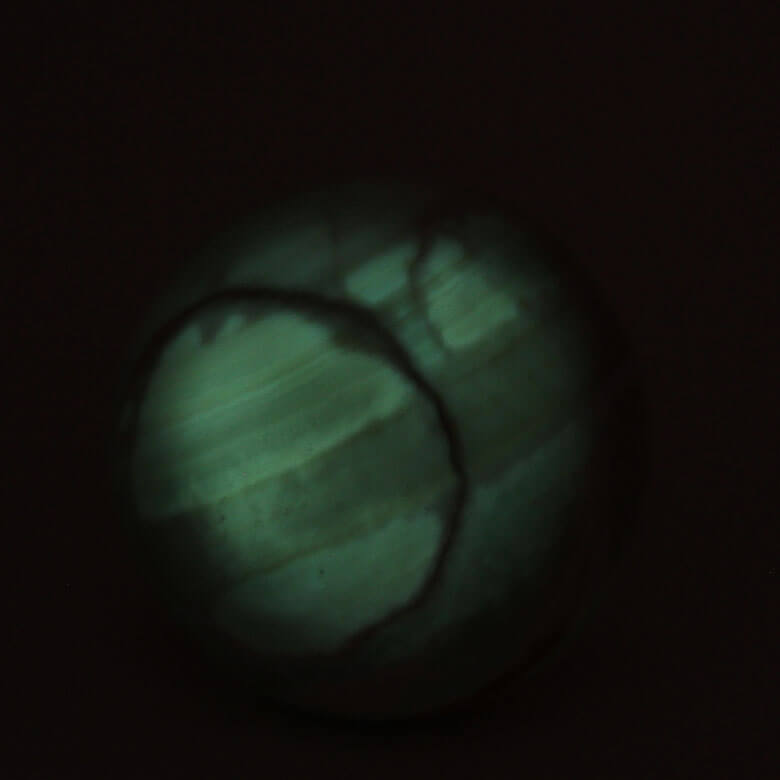 phosphorescent coati aragonite sphere glowing in the dark ethical Crystals Gemrock
